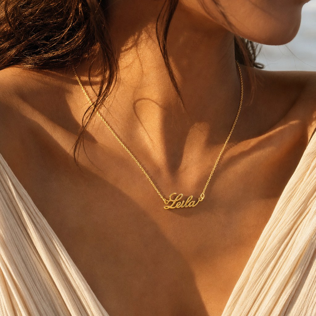 Leila name necklace in gold, worn